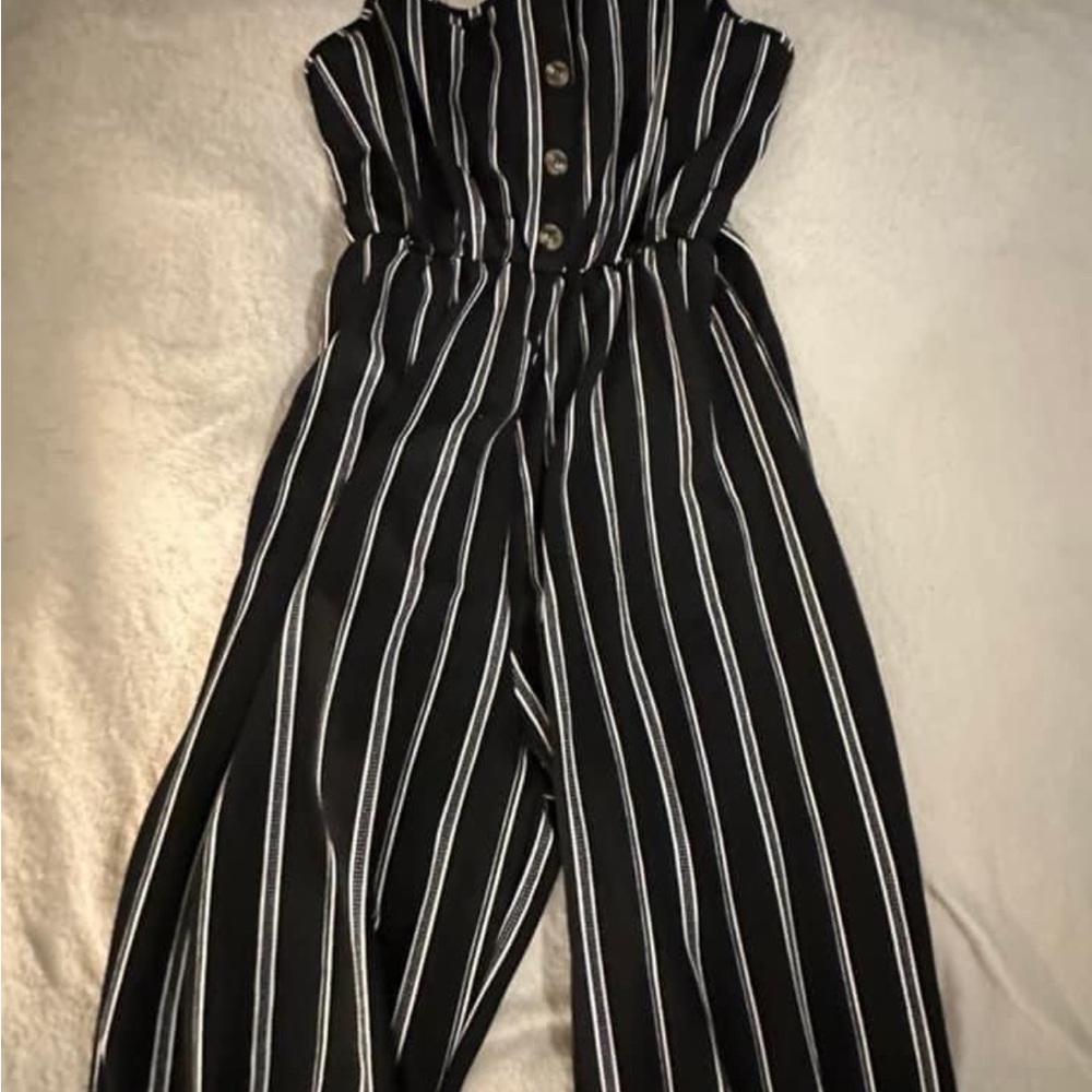 Cute jumpsuit!! Spaghetti straps and long pants.